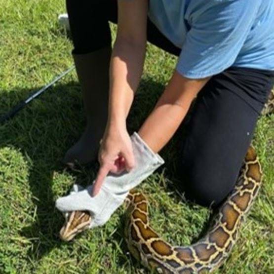 A biologist demonstrates the grasp technique